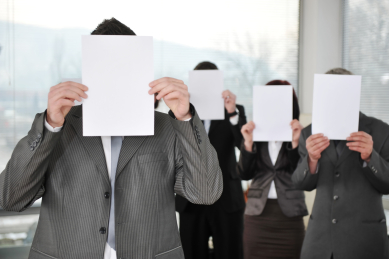 group of business people holding blank signs